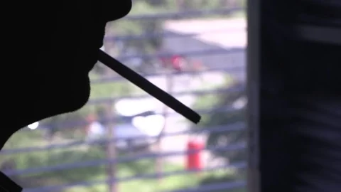 Man with a cigarette Stock Footage 88947814