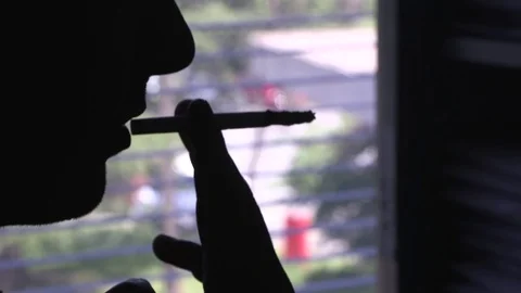 Man with a cigarette Stock Footage 88947856