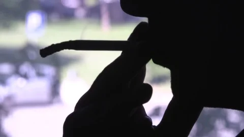 Man with a cigarette Stock Footage 88947874