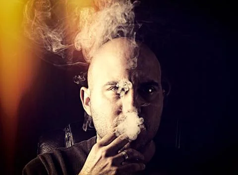 Man with cigarette Stock Photos