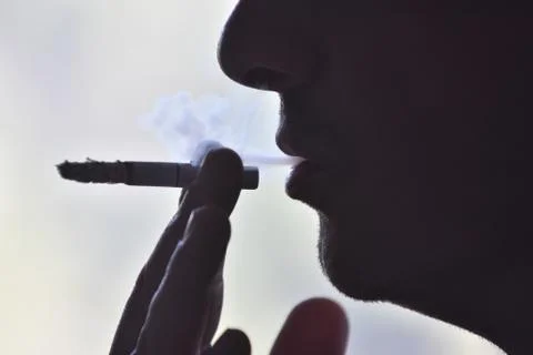 Man with a cigarette Stock Photos