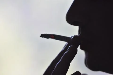 Man with a cigarette Stock Photos