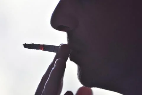 Man with a cigarette Stock Photos