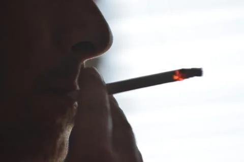 Man with a cigarette Stock Photos