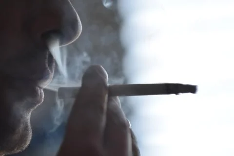 Man with a cigarette Stock Photos