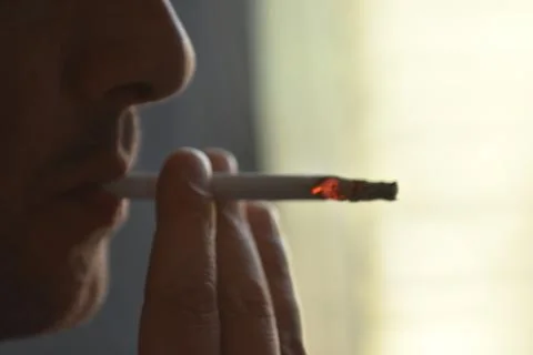 Man with a cigarette Stock Photos