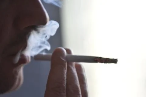 Man with a cigarette Stock Photos