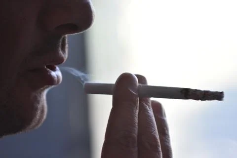 Man with a cigarette Stock Photos