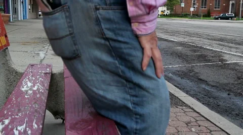 Man on city bench Stock Footage 3960470