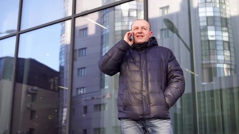 Man in the city making a phone call with smartphone Stock Footage 73128151