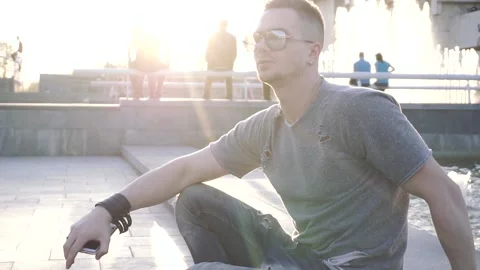 Man in city at sunset Stock Footage 89159718