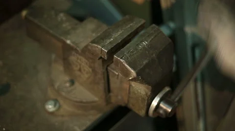 The man clamps the vise Stock Footage 59595918