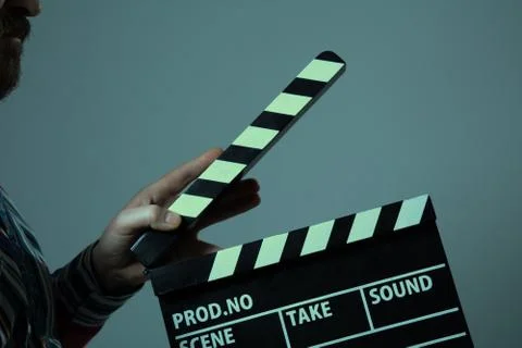 Man with clapperboard cinema Stock Photos
