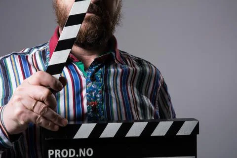 Man with clapperboard cinema Stock Photos