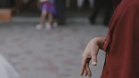 The man claps his hands actively and boldly Stock Footage 136575276