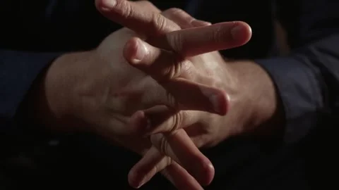 Man clasping hands feeling anxiety and stress. Person interlocking hands Video stock 324960397