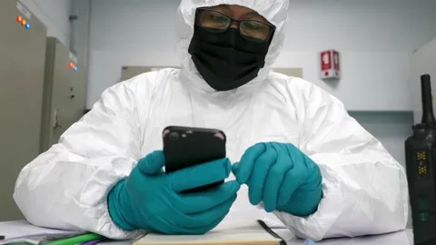 Man in the clean roon use mobile phone Stock Footage 149591498