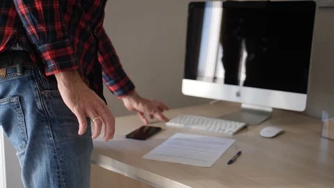 Man clean up work space on table Stock Footage 98094124