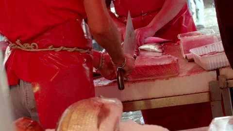 Man cleaning and cutting fish in street fish market in catania, sicily 스톡 동영상 233736853
