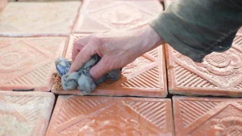 Man cleaning ceramic tiles. Man cleaning ceramic tiles. Stock Footage 154893533