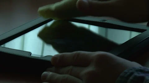 Man cleaning digital tablet Stock Footage 32879391