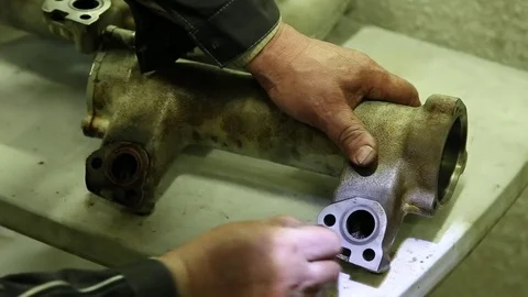 Man cleaning dirty part of the engine system Stock Footage 85242063