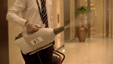 Man cleaning elevator in bank. Stock Footage 128842060