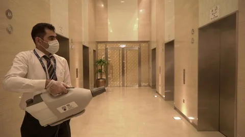 Man cleaning elevator. Stock Footage 128841120