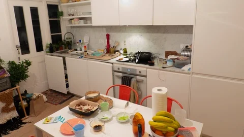 Man cleaning his kitchen Stock Footage 104508672