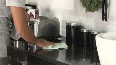 Man cleaning kitchen Stock Footage 83961818