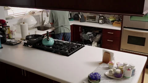 Man cleaning messy home kitchen time-lapse Stock Footage 287267751