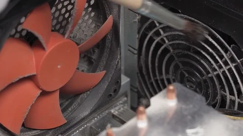 Man cleaning ventilation system in computer case Stock Footage 104540687