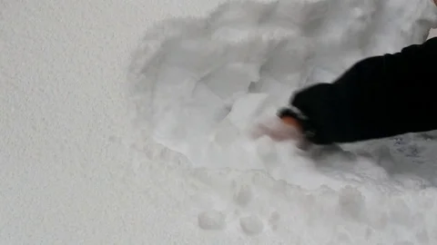 Man cleans car from snow Stock Footage 71149978