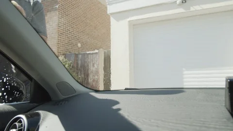 Man Cleans Car Windscreen by Hand Video stock 128823455