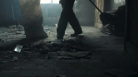 Man cleans the garbage in the room Stock Footage 108549478