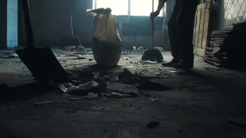 Man cleans the garbage in the room Stock Footage 108549966