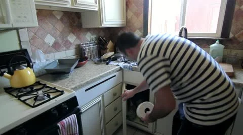 Man Cleans Kitchen Sped Up Stock Footage 10931133