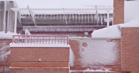 Man cleans snow during blizzard - Madrid Video stock 146411536