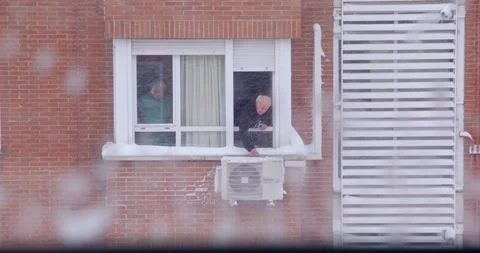 Man cleans snow during blizzard - Madrid Video stock 146411942