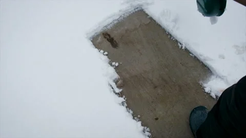 Man cleans snow with a shovel. Selective focus. Stock Footage 221889532