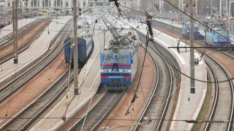 Man cleans the train at the main train station in Odesa, Ukraine - Editorial, 4K Stock Footage 171588802