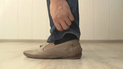 Man cleans wrong shoes Stock Footage 39719407