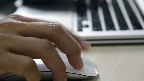 Man click mouse with computer laptop on desk. Stock Footage 144240307