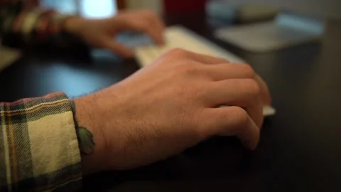 Man clicking on the computer mouse in the office Stock Footage 159469004