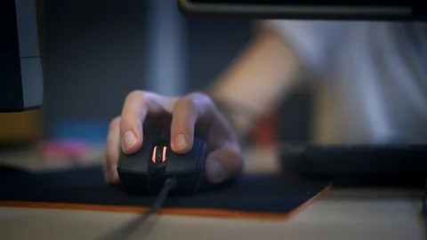 A man clicking digital mouse and working on computer. The concept of doing Video stock 114240345