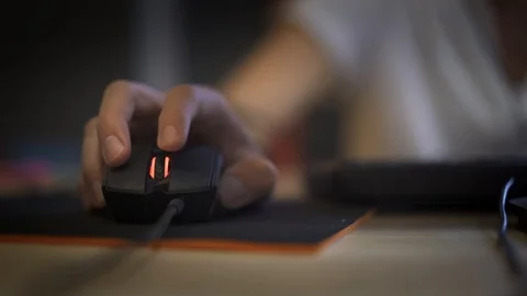 A man clicking digital mouse and working on computer. The concept of doing Stockbeeldmateriaal 114241425