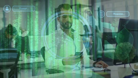 Man clicking mouse and lifting smartphone in tech office, activating green HUD Stock Footage 333449370