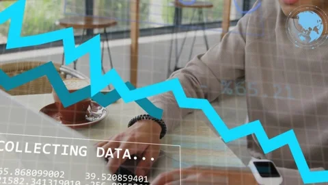 Man clicking mouse and typing at cafe table, activating HUD collecting data for Stock Footage 335762019
