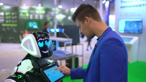Man clicking on touch screen robot learning digital data base information 4K. Stock Footage 139316353