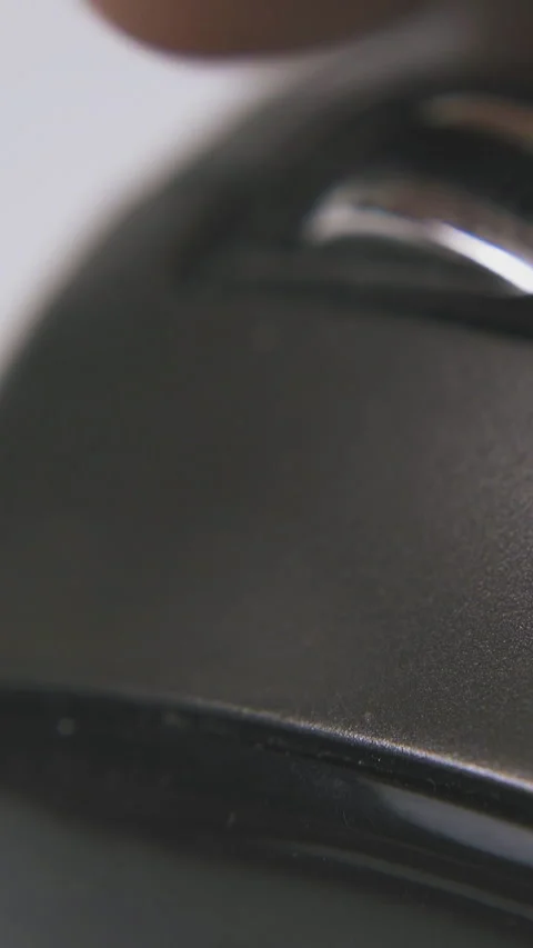 Man clicks button on computer mouse in white background Stock Footage 317387780